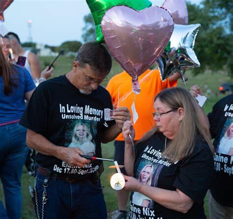 Elaine Nix's parents at a memorial